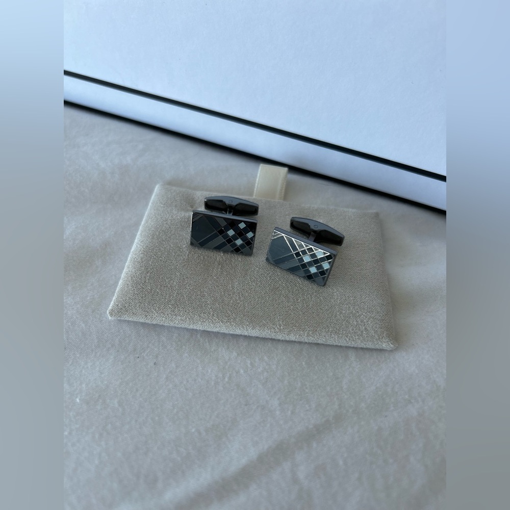 Burberry Ruthenium plated Nova Check cufflinks.